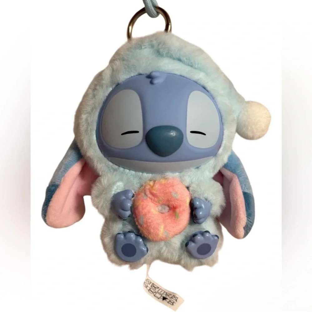 Disney MINISO Stitch Eat Something Before
Sleep Vinyl Plush KeychainSleepy Donut - Picture 2 of 9